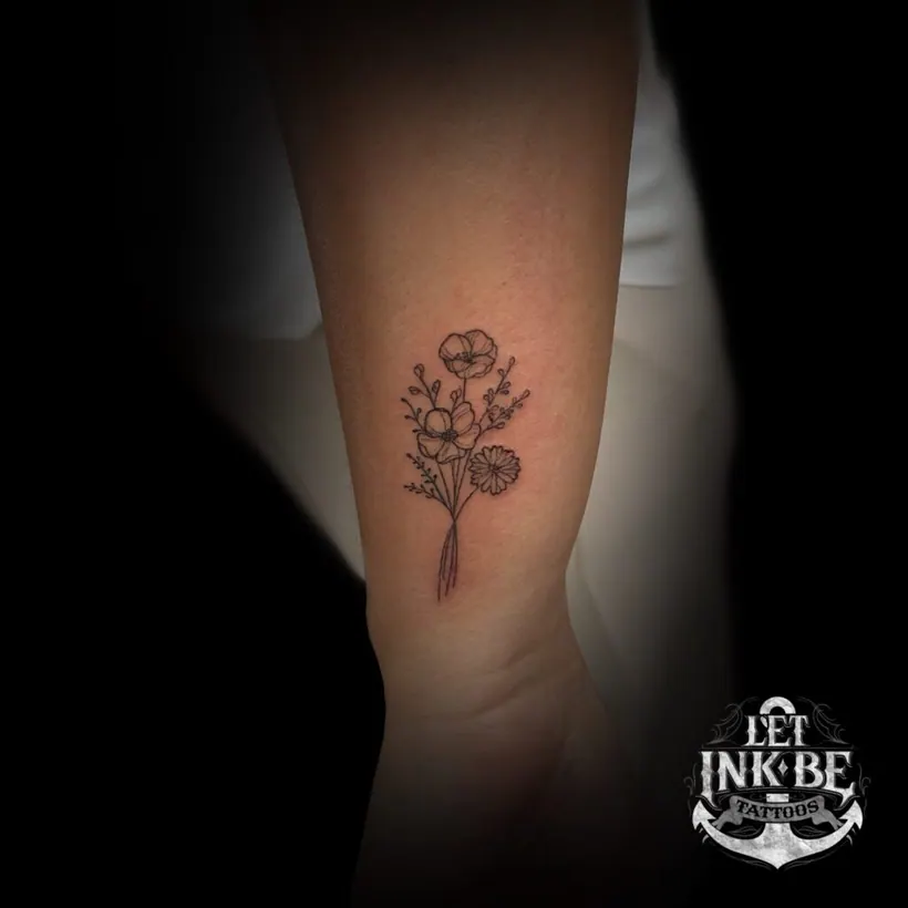 fine line floral tattoo