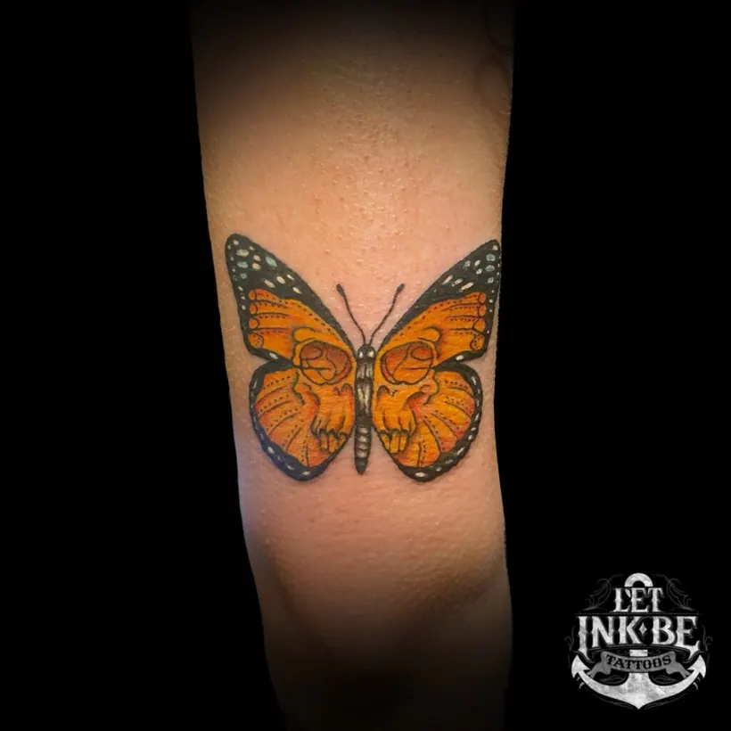 animal tattoo vlinder