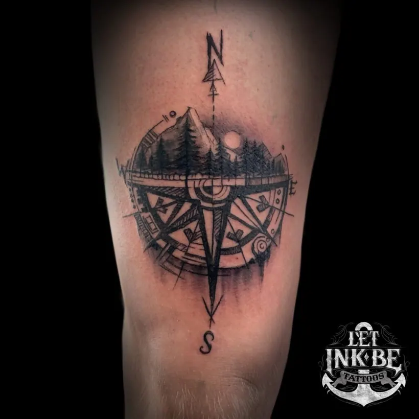 black and grey tattoo compas